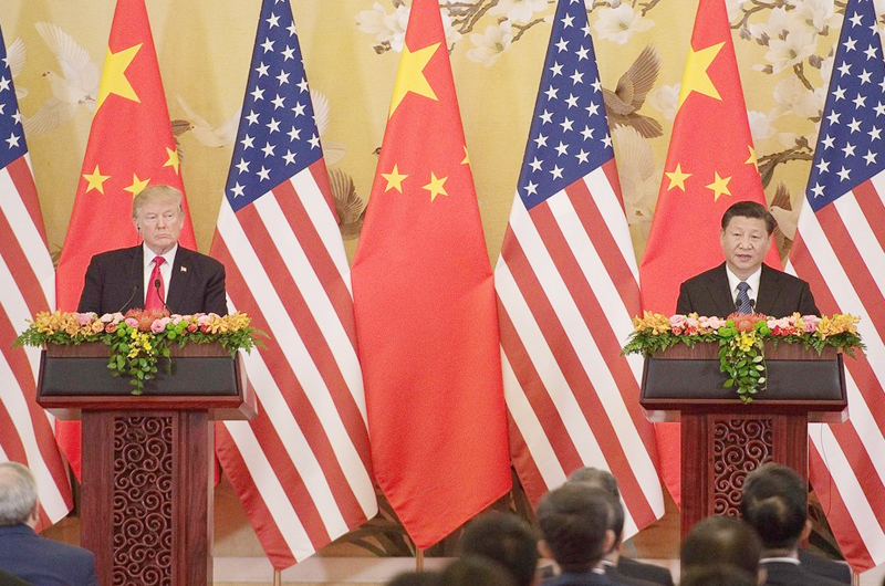 China y EUA firman primera fase del acuerdo comercial